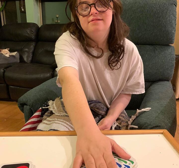 Lily playing uno
